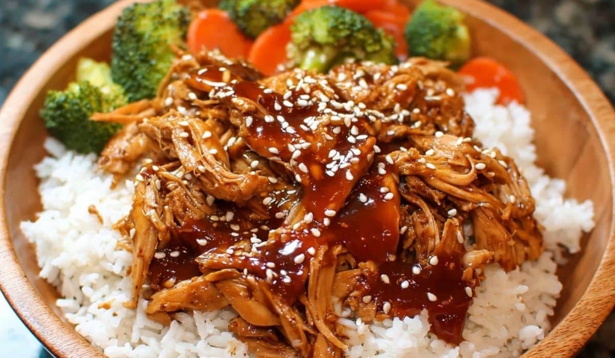 Crock Pot Teriyaki Chicken served over rice with broccoli and carrots