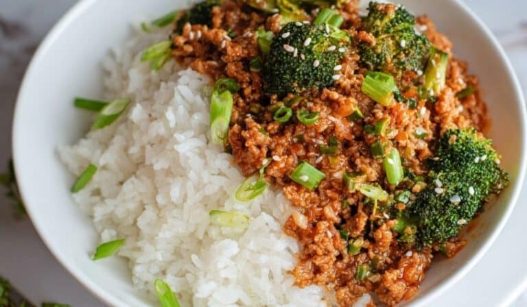 Firecracker Ground Chicken served with white rice and broccoli in a bowl