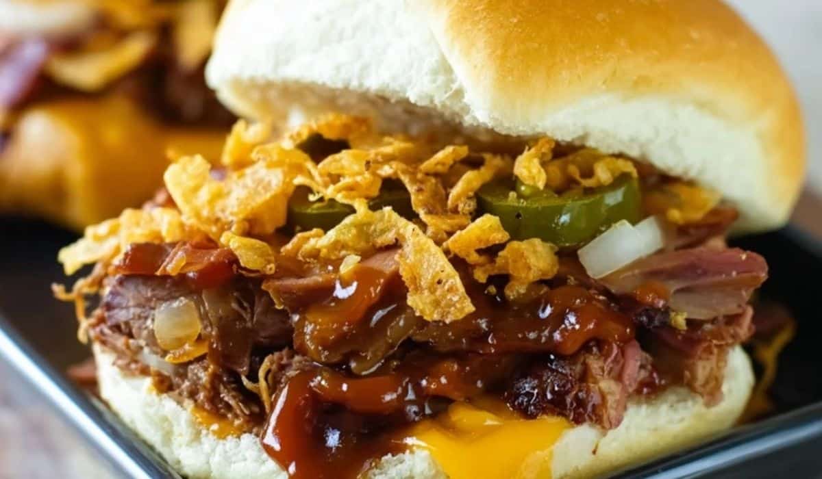 Slow Cooker Cowboy Sandwiches loaded with BBQ beef, crispy onions, and jalapeños