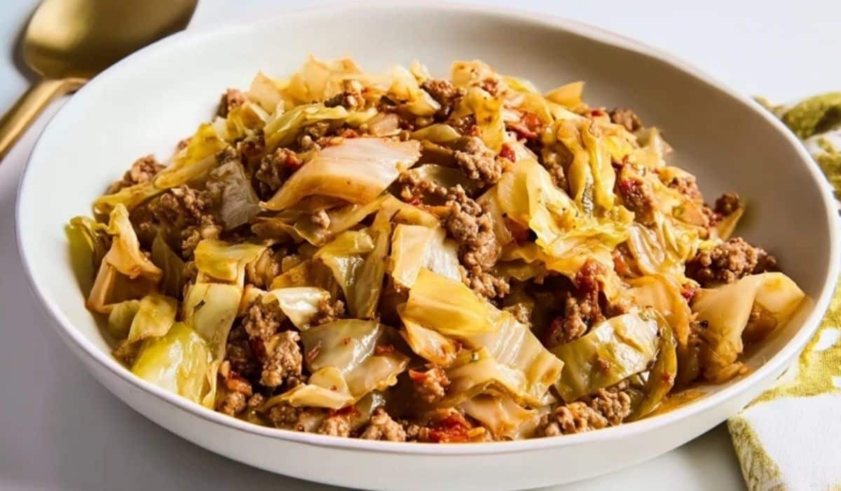 Ground Beef and Cabbage cooked in a skillet with tender cabbage and seasoned ground beef