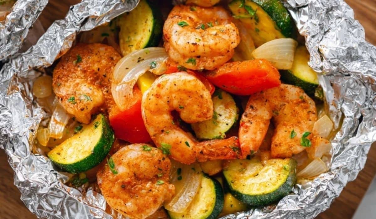 Air Fryer Shrimp Foil Packets with zucchini, bell peppers, and onions cooked to perfection