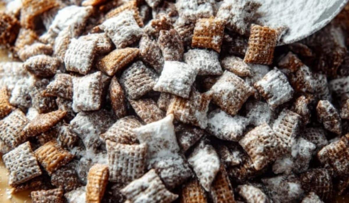 Chex Mix Puppy Chow coated with powdered sugar
