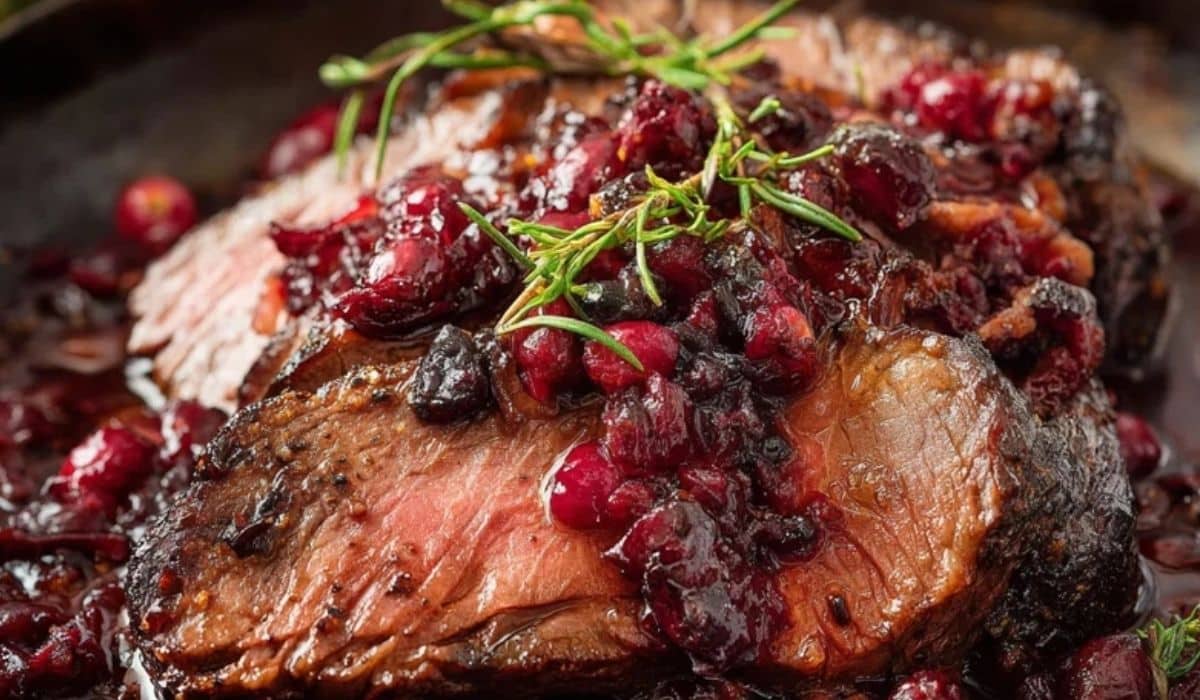 Cranberry Roast Beef Recipe with tender slices and holiday glaze