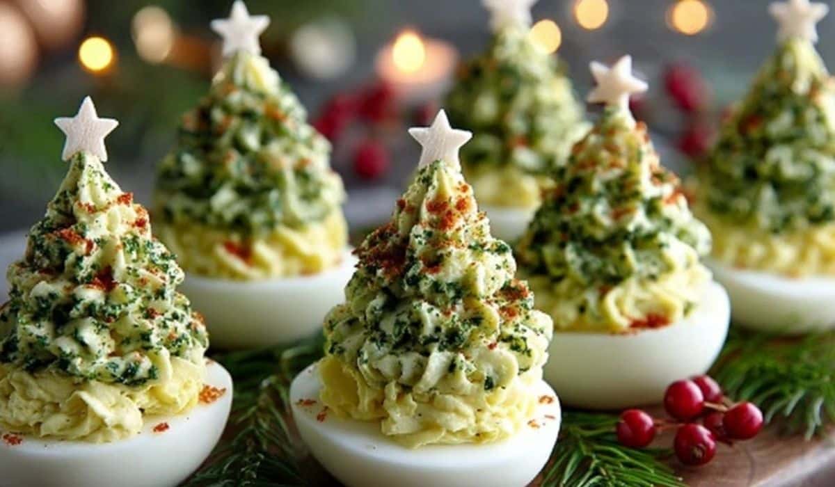 Deviled Egg Christmas Trees decorated with white star toppers and herbs