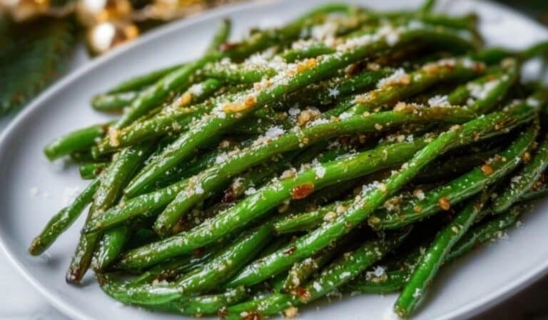 Crispy Oven Baked Green Beans with Parmesan served on a white plate