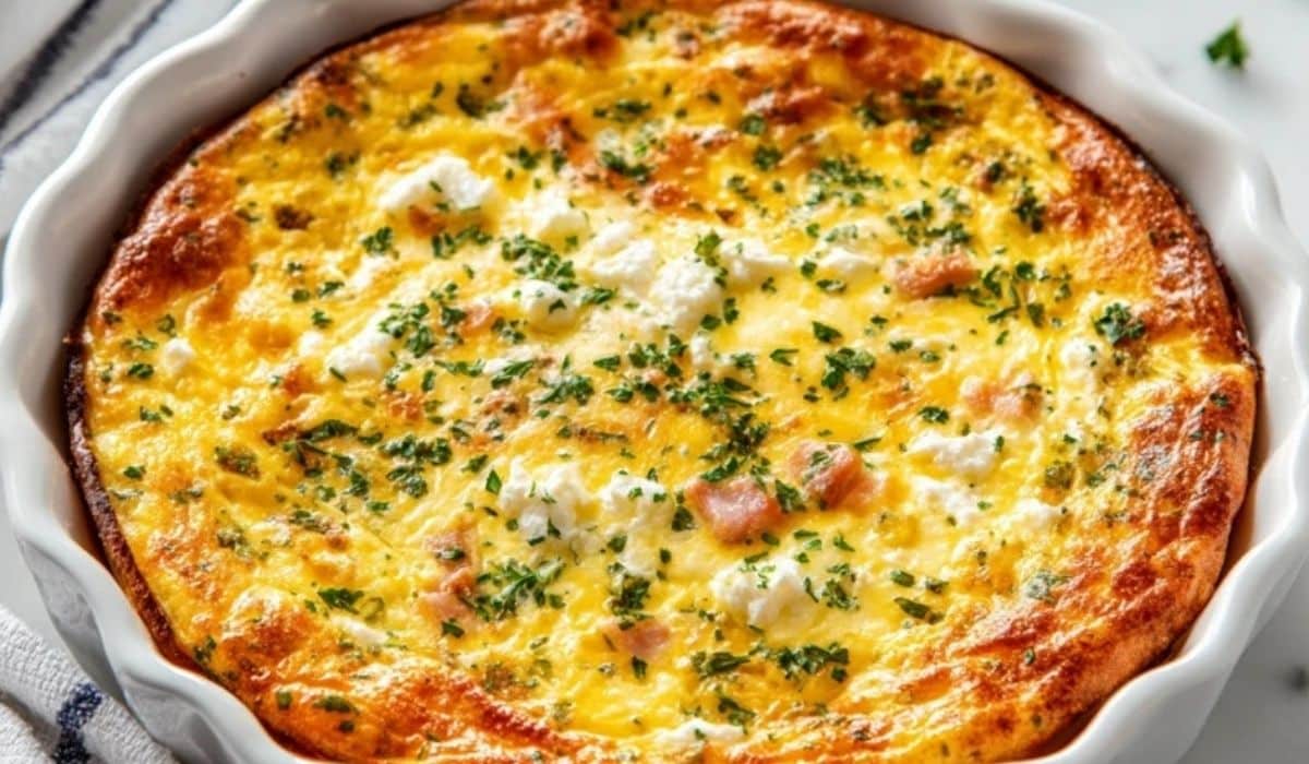 Crustless Cottage Cheese Breakfast Quiche baked golden in white pie dish