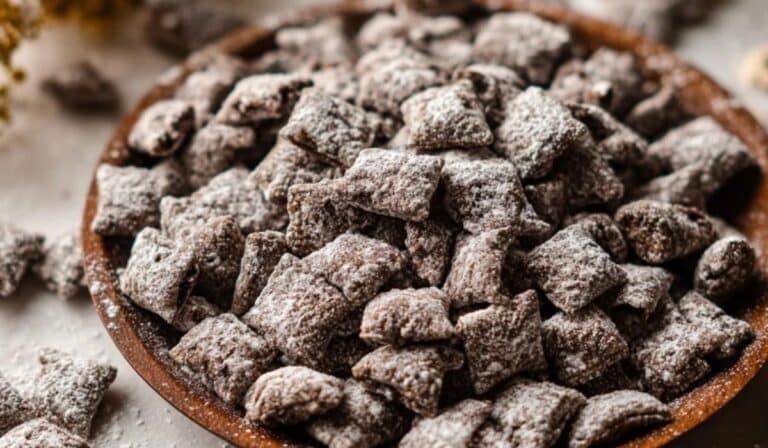 Brownie Batter Puppy Chow in a wooden bowl