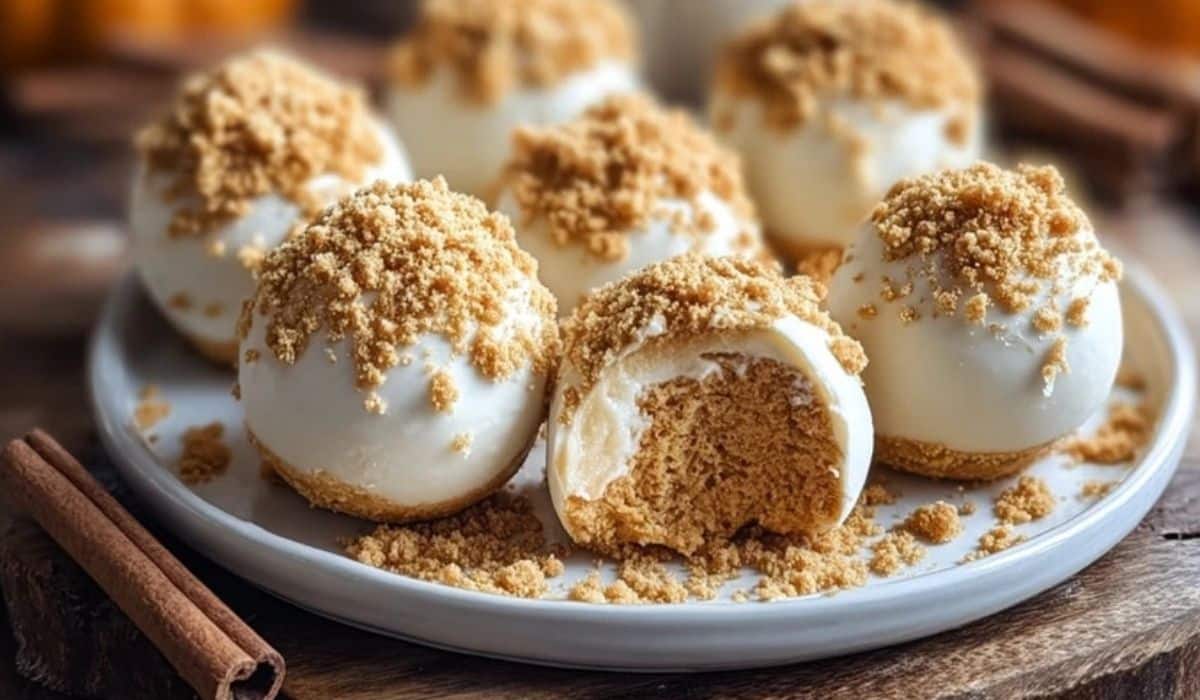 No Bake Pumpkin Cheesecake Balls served on a wooden board