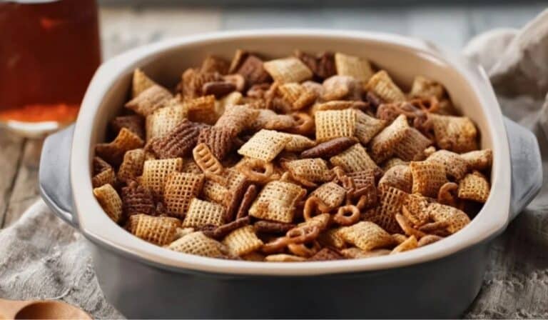 Simple Homemade Chex Mix Classic in a white ceramic baking dish