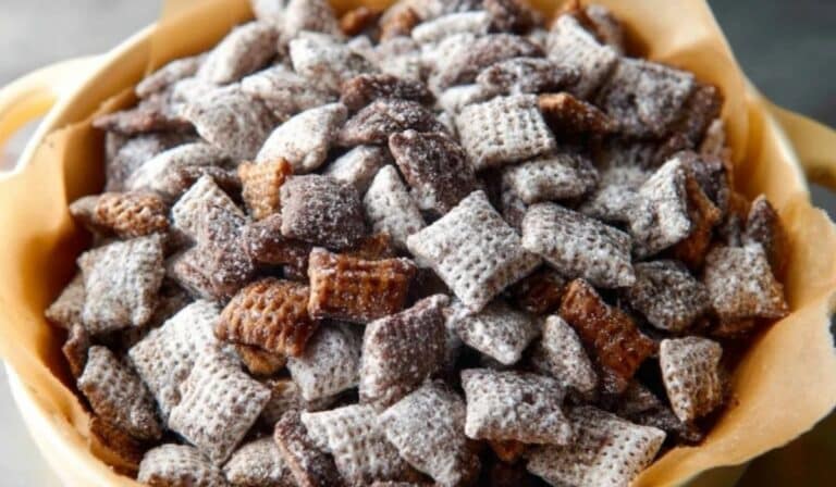 Puppy Chow Chex Mix Recipe served in a large festive bowl