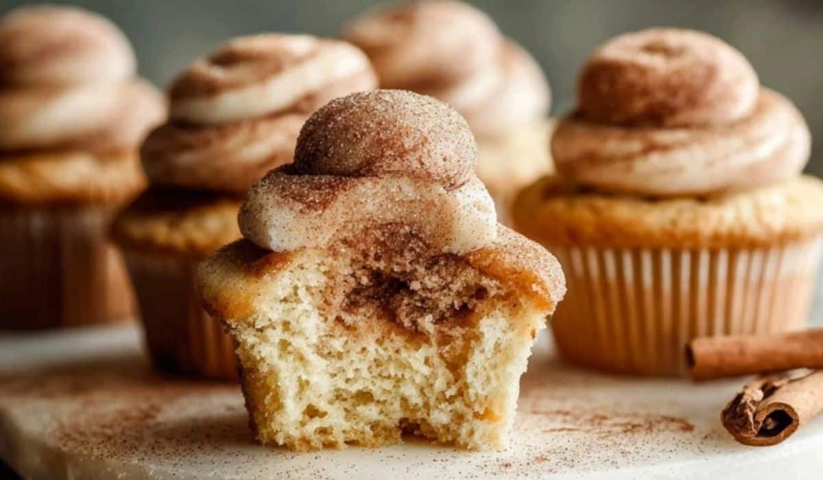 Cinnamon-Swirl Snickerdoodle Cupcakes on a rustic plate