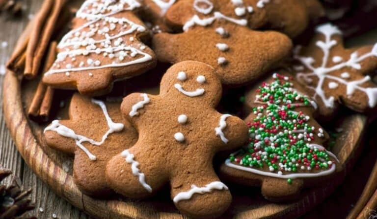 Gingerbread Cookies arranged on rustic wooden plate