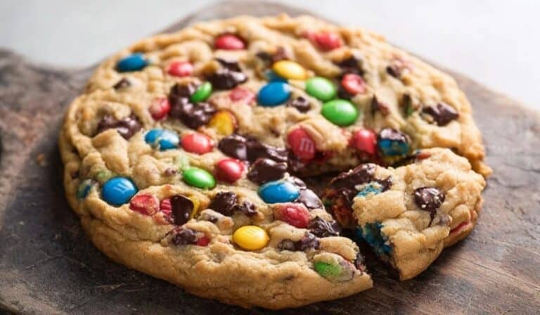 One Giant Monster M&M Cookie on wooden board