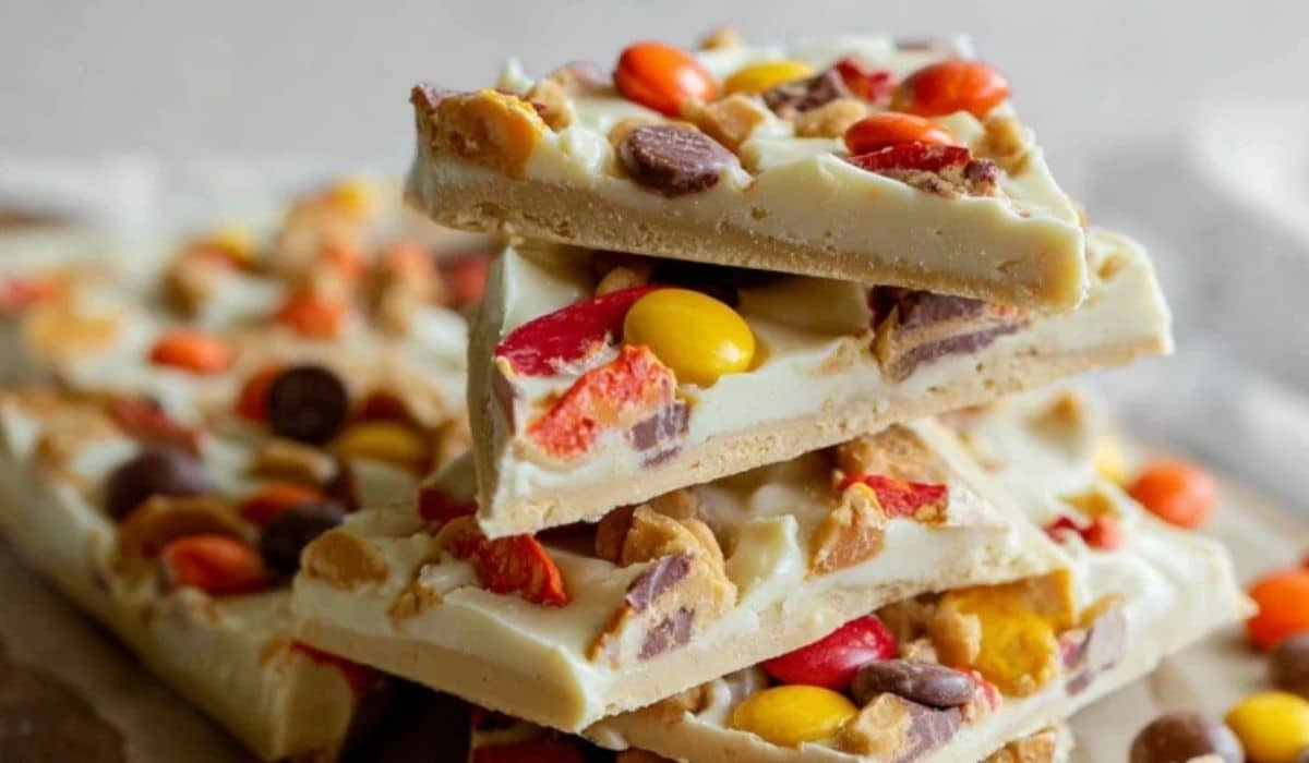 Reese’s Pieces Peanut Butter White Chocolate Bark on serving board