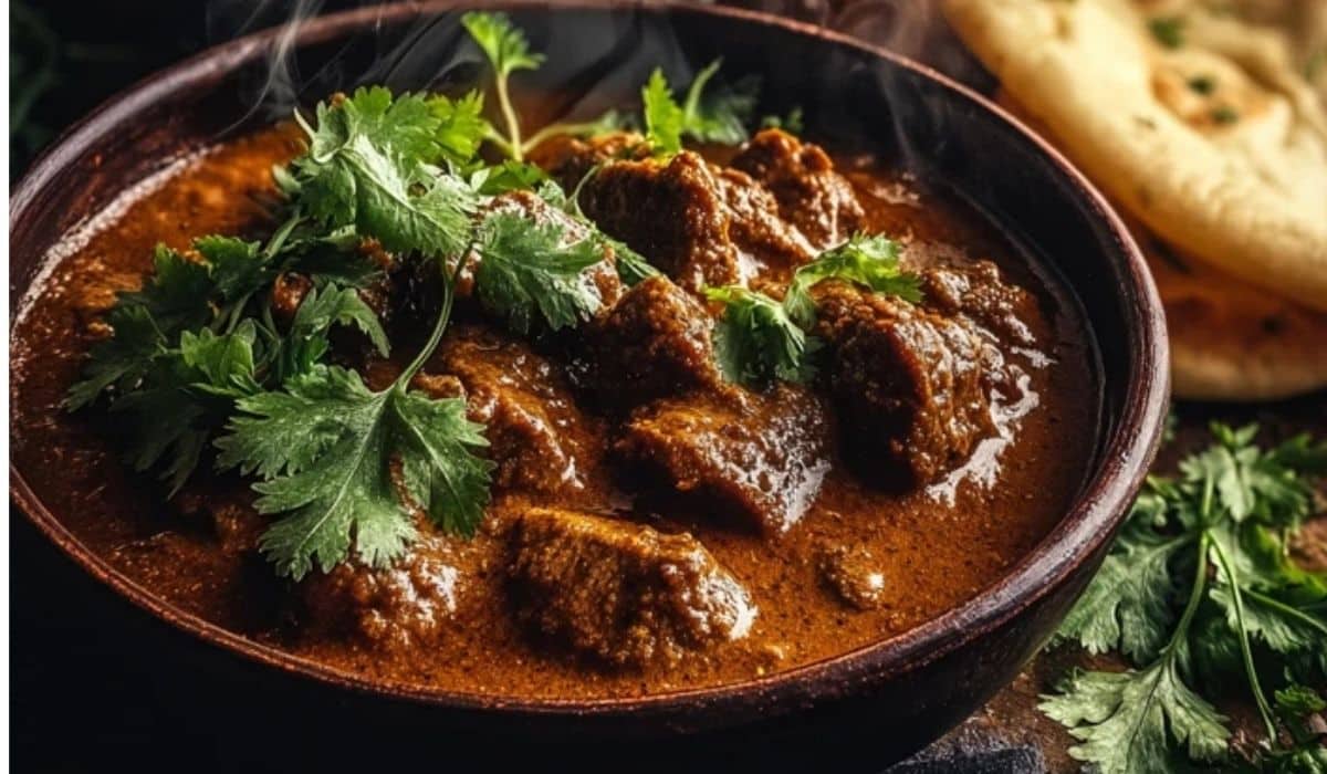 Easy Indian Beef Curry in Slow Cooker served with naan