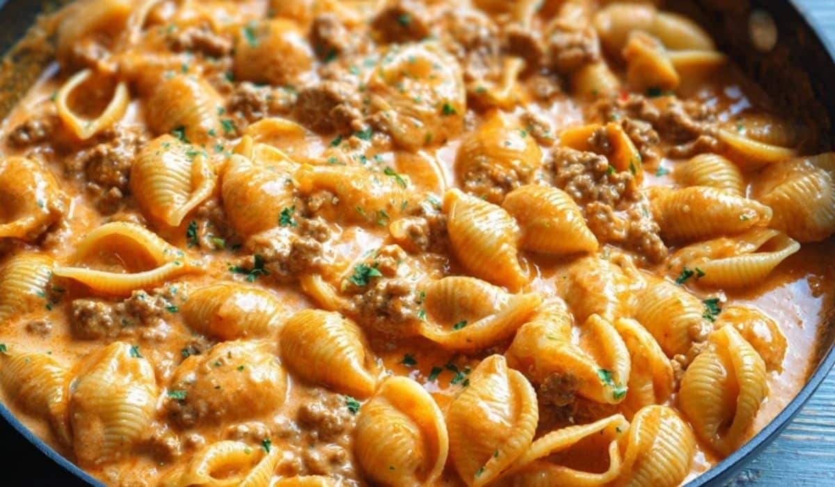 Creamy Beef and Shells in skillet with rich tomato cream sauce
