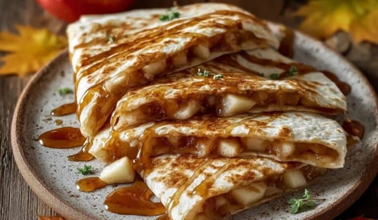Apple Cinnamon Breakfast Quesadillas served with honey on rustic plate