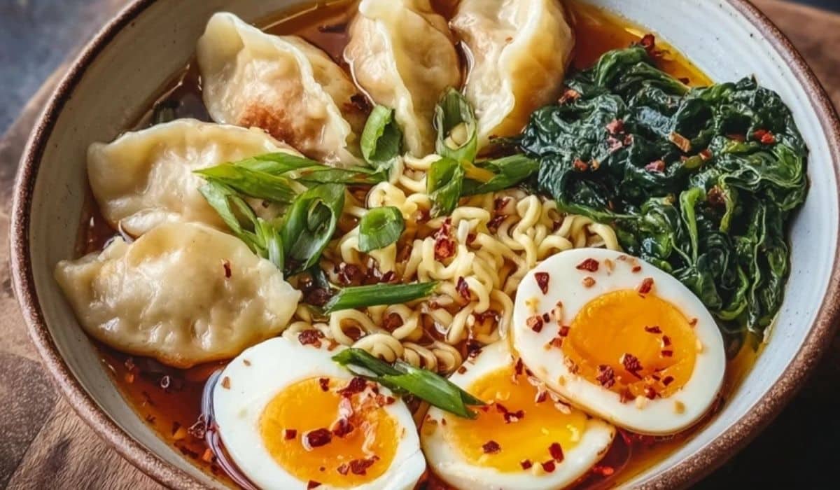 Savory Dumpling Ramen Bowl with Soft-Boiled Eggs and Fresh Greens in rustic bowl