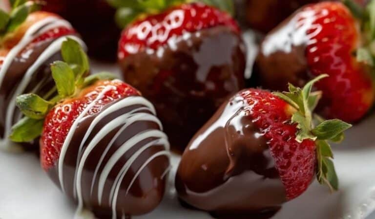 Chocolate-Covered Strawberries served on white plate overhead