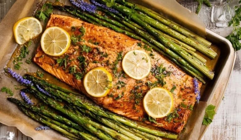One-pan salmon with asparagus on a sheet pan with lemon and parsley